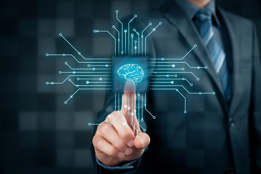 a futuristic depiction of a man pressing a button that appears to be a brain chip or artificial intelligence icon