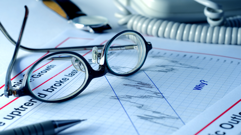 glasses over paperwork