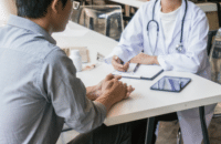 doctors sitting at a table