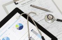 charts, papers and a stethescope