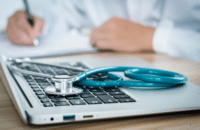 laptop with stethoscope